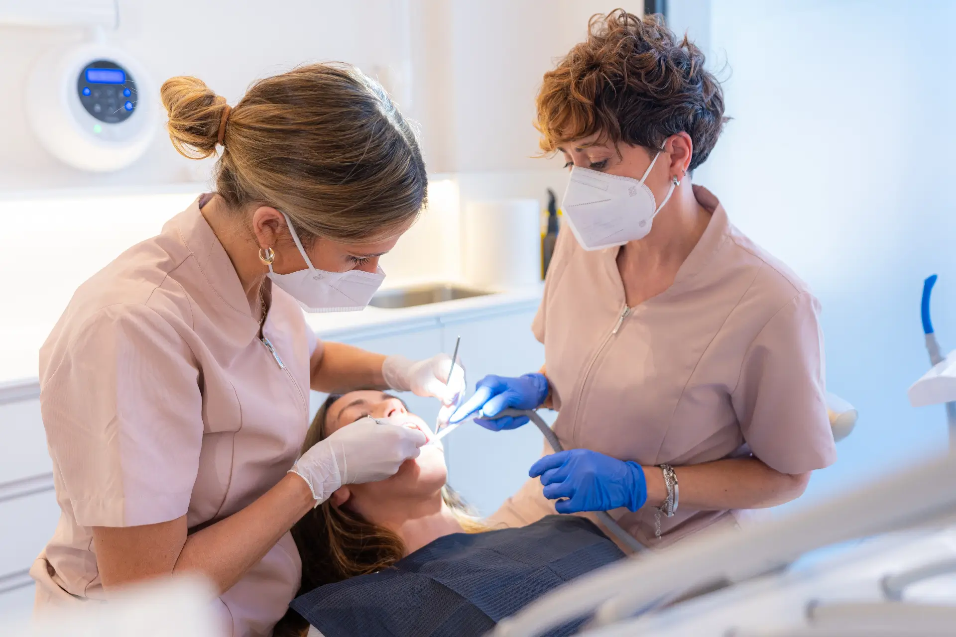 Patient Receiving Dental Check-Up From Dentist