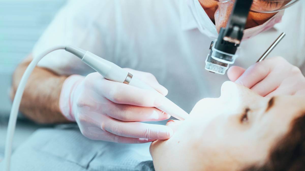 A close up picture of dentist and patient