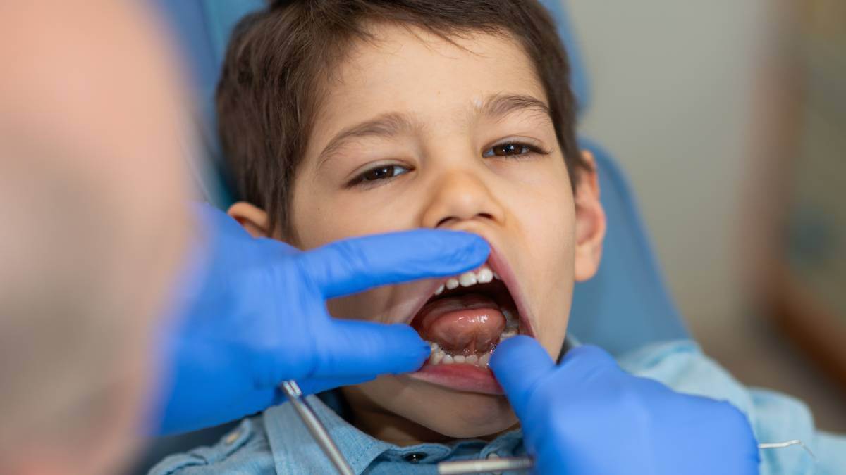 child getting checked